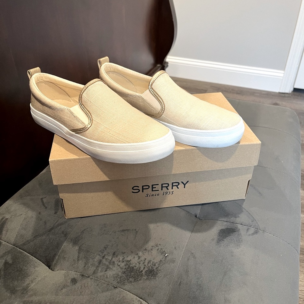 The perfect Sperry slip on shoe in light gold.